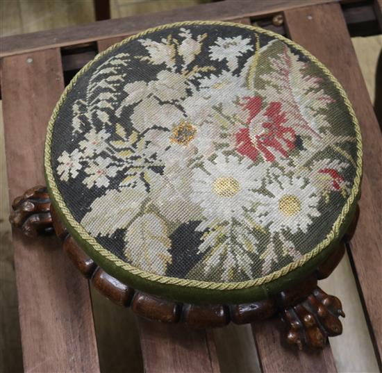 A Victorian mahogany tapestry topped foot stool W.38cm